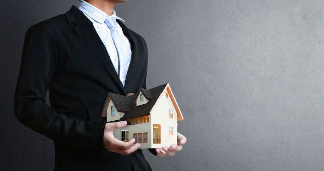 Guy with house