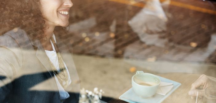 Why You Should Stop Walking Away from Imperfect Deals 3 woman behind window smiling drinking coffee in cafe