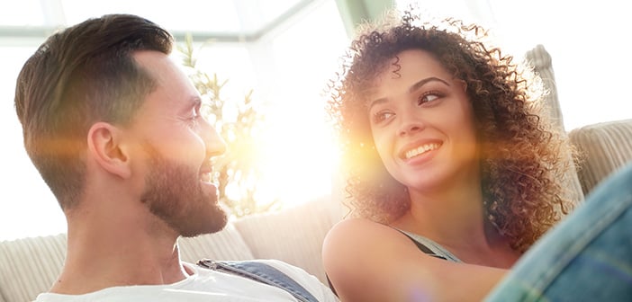 man and woman looking at each other