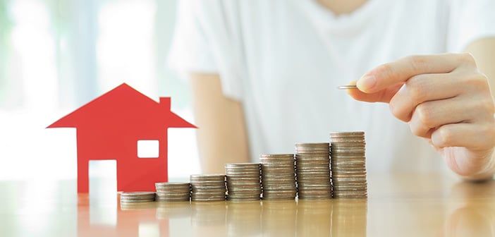 stack coins house