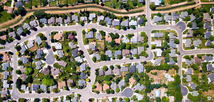 aerial view of houses and culdesacs and tree-lined streets