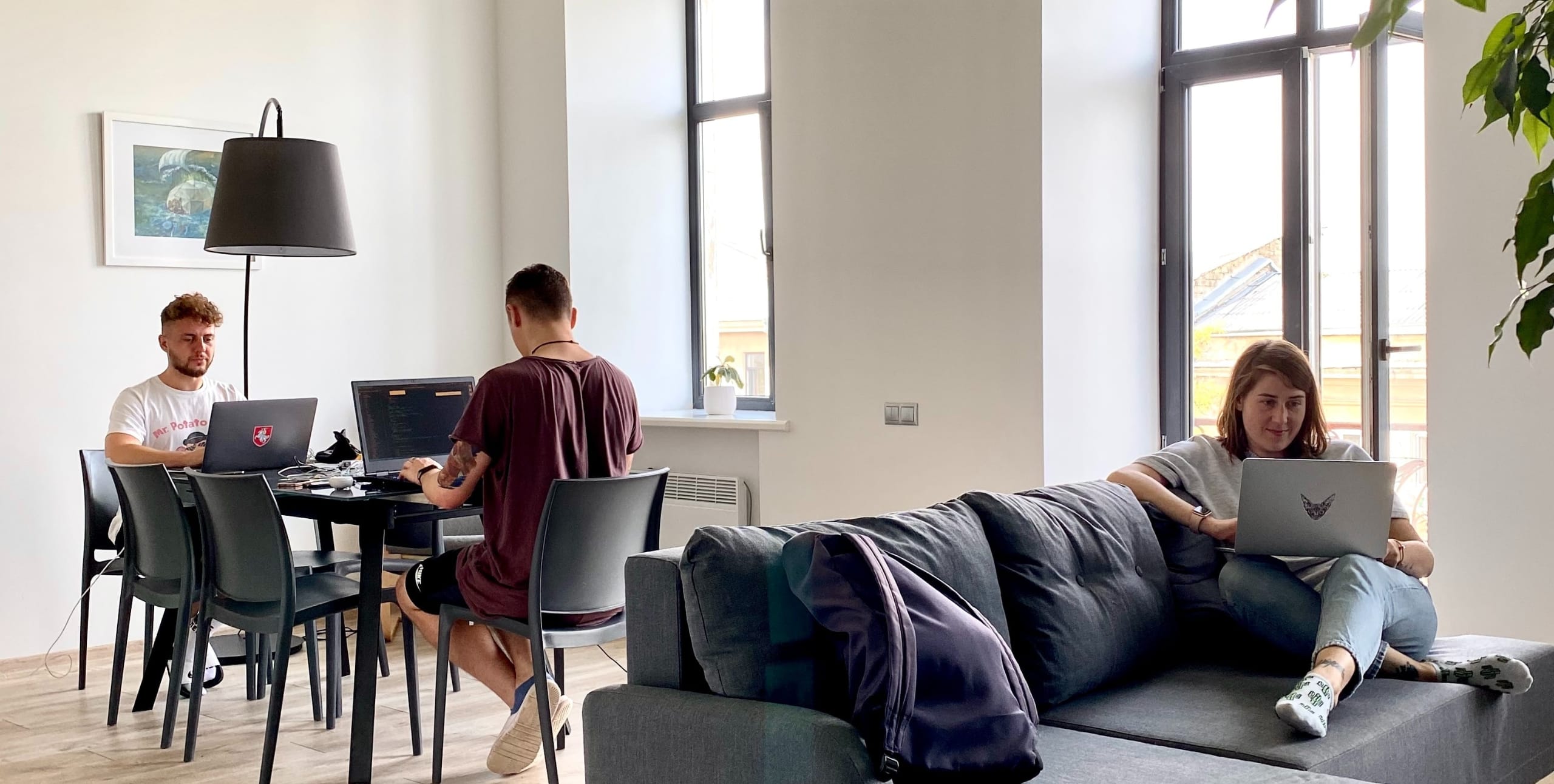 people working in a coliving apartment