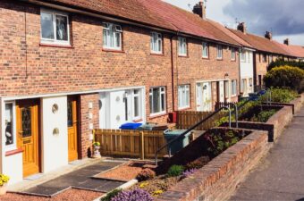 Investing in a Fourplex: Pros, Cons, & Tips For Investors
