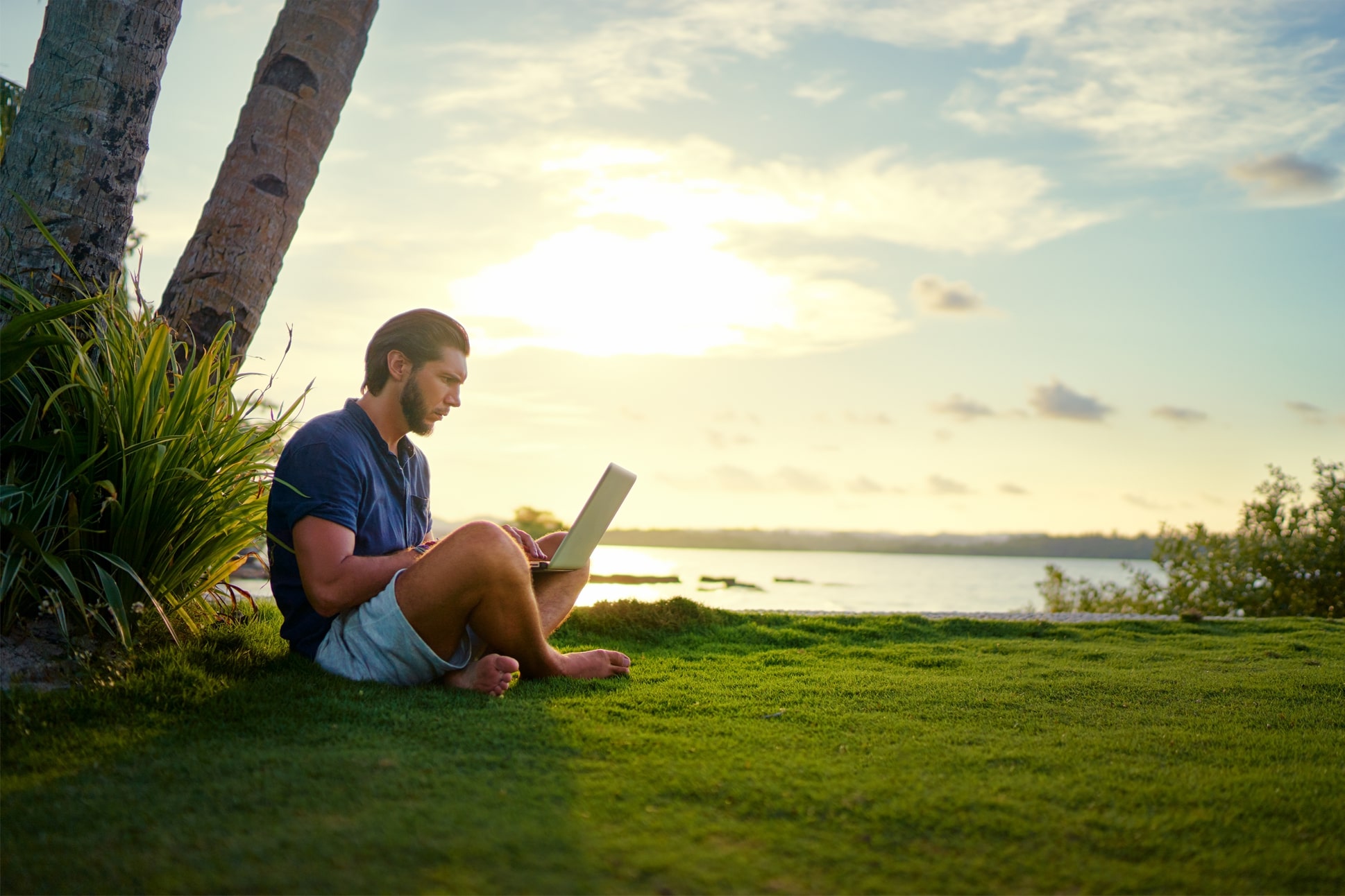 man sitting with his computer