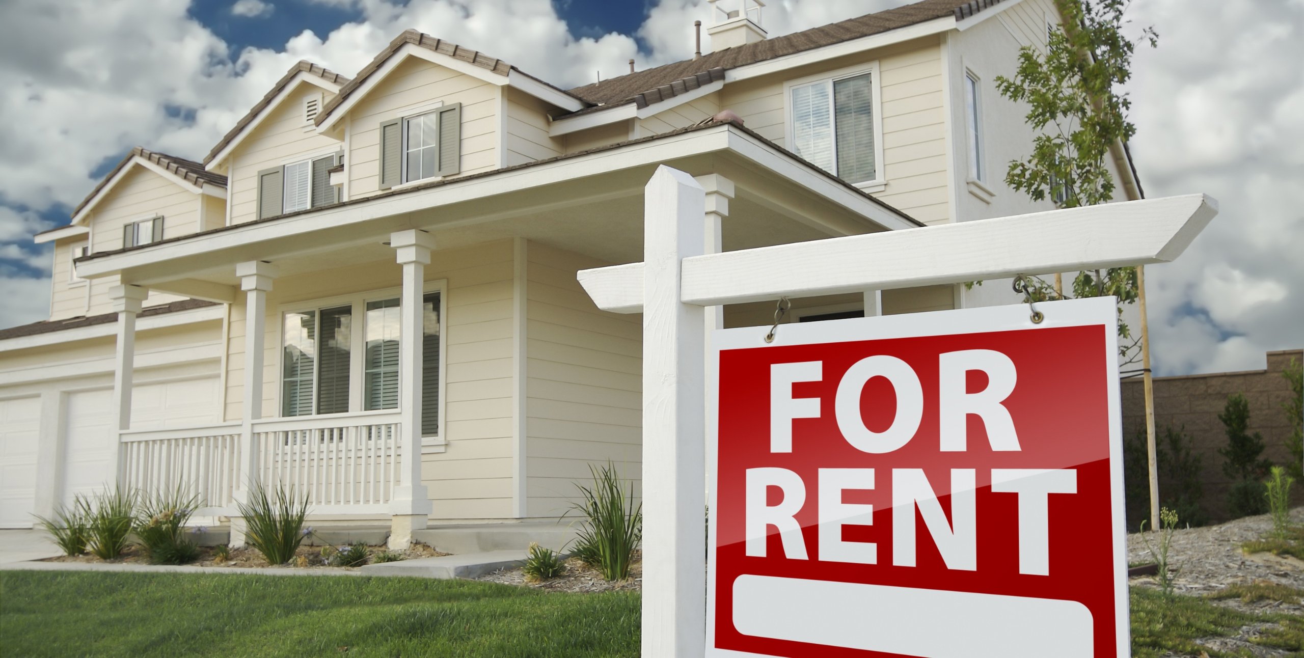 for rent sign in front of house