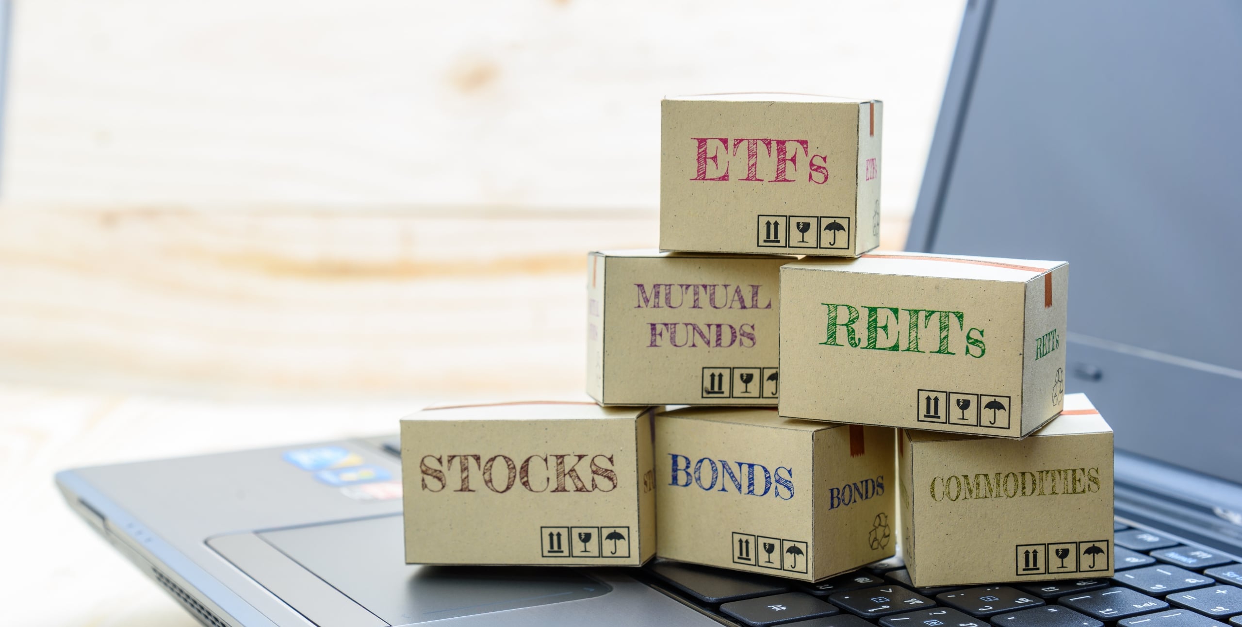 boxes labeled with investment types