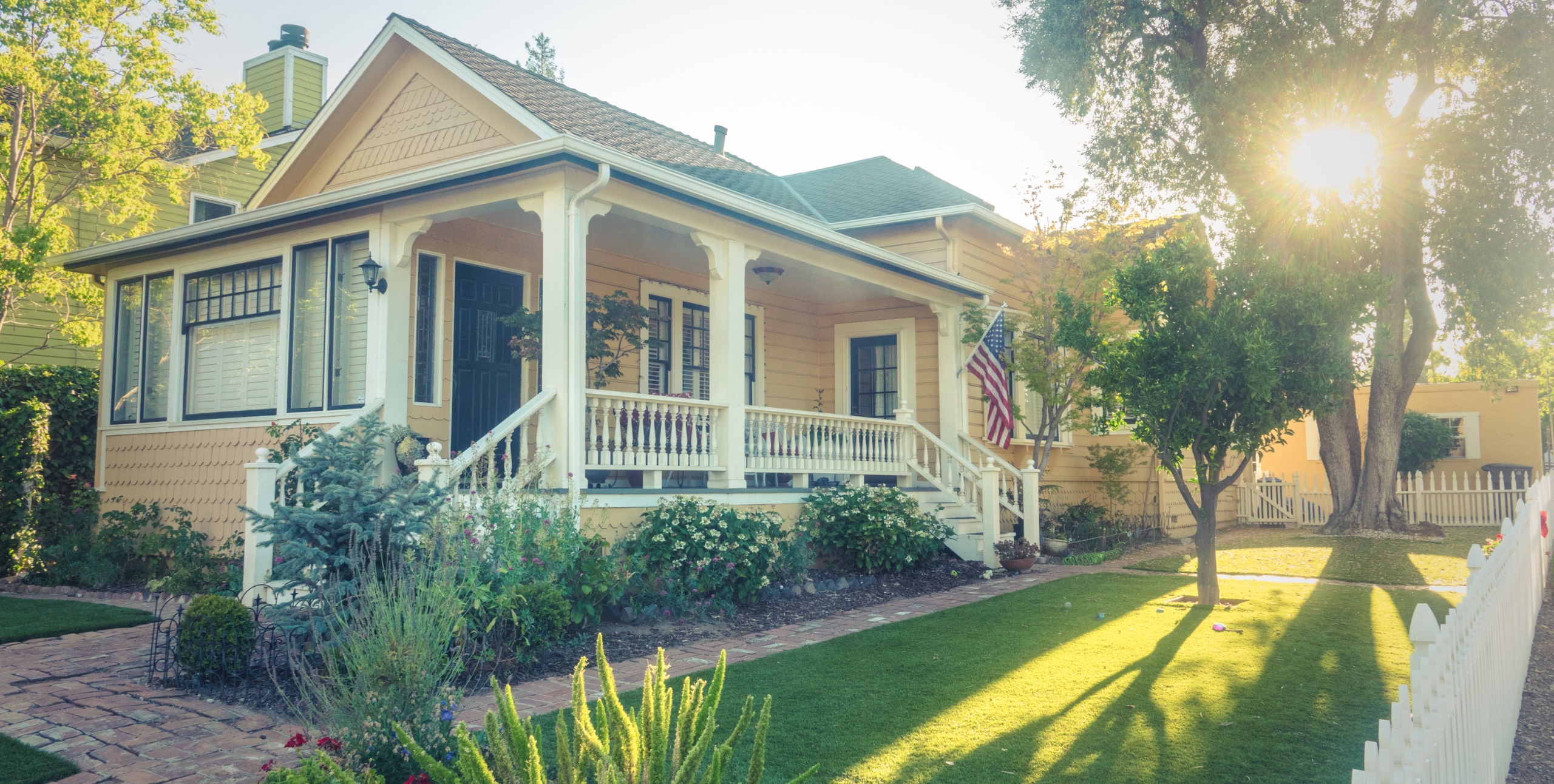 home with american flag in front