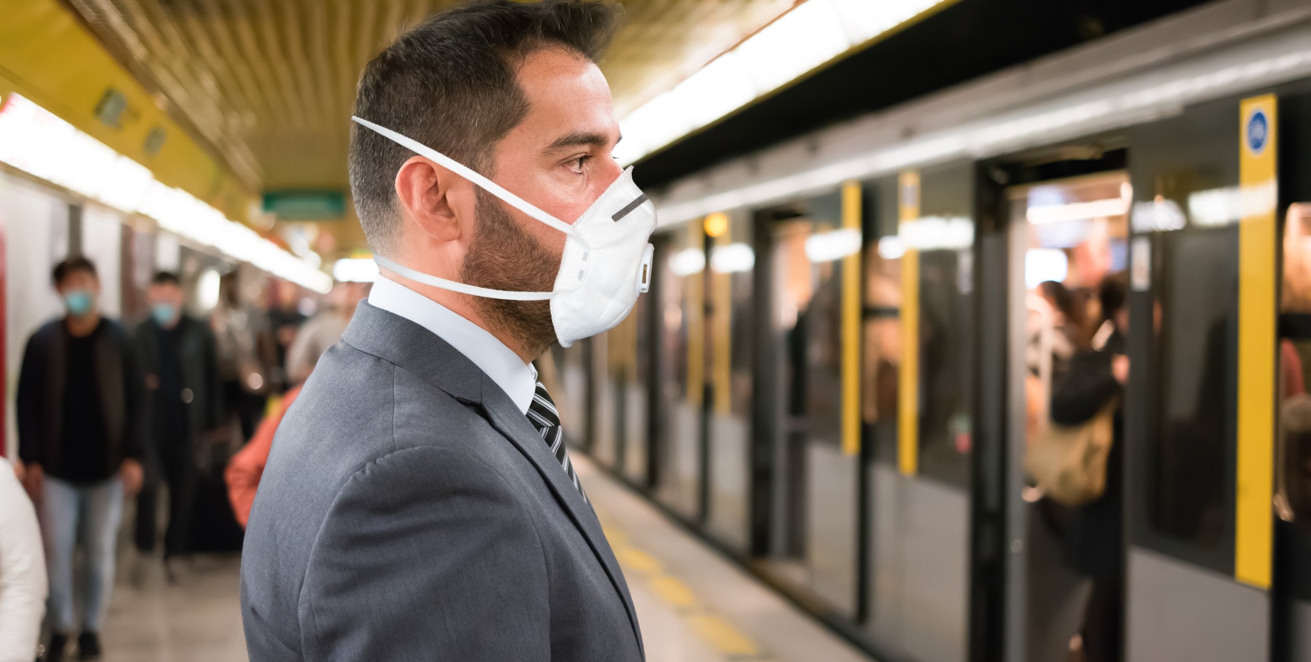 investor wearing covid mask